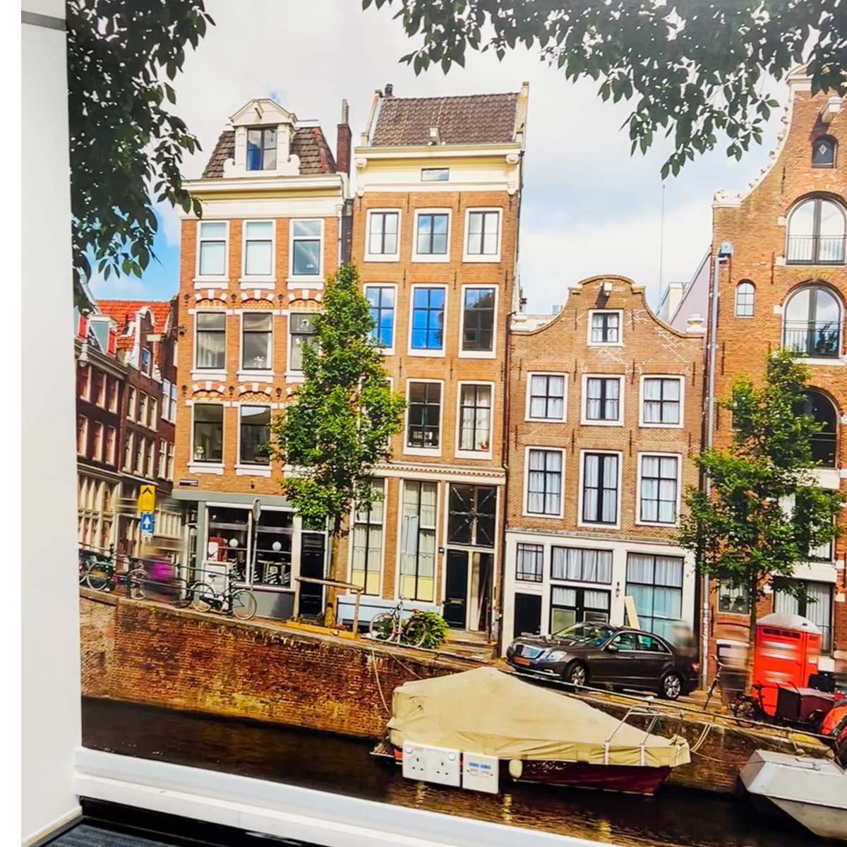Amsterdam street scene wallpaper mural with canal and buildings